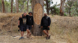 Uncle Mick, Mitchil and Corey with their art - We Scar Many Trees